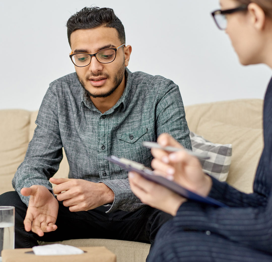 A Therapist Talking to a Member at CODAC.