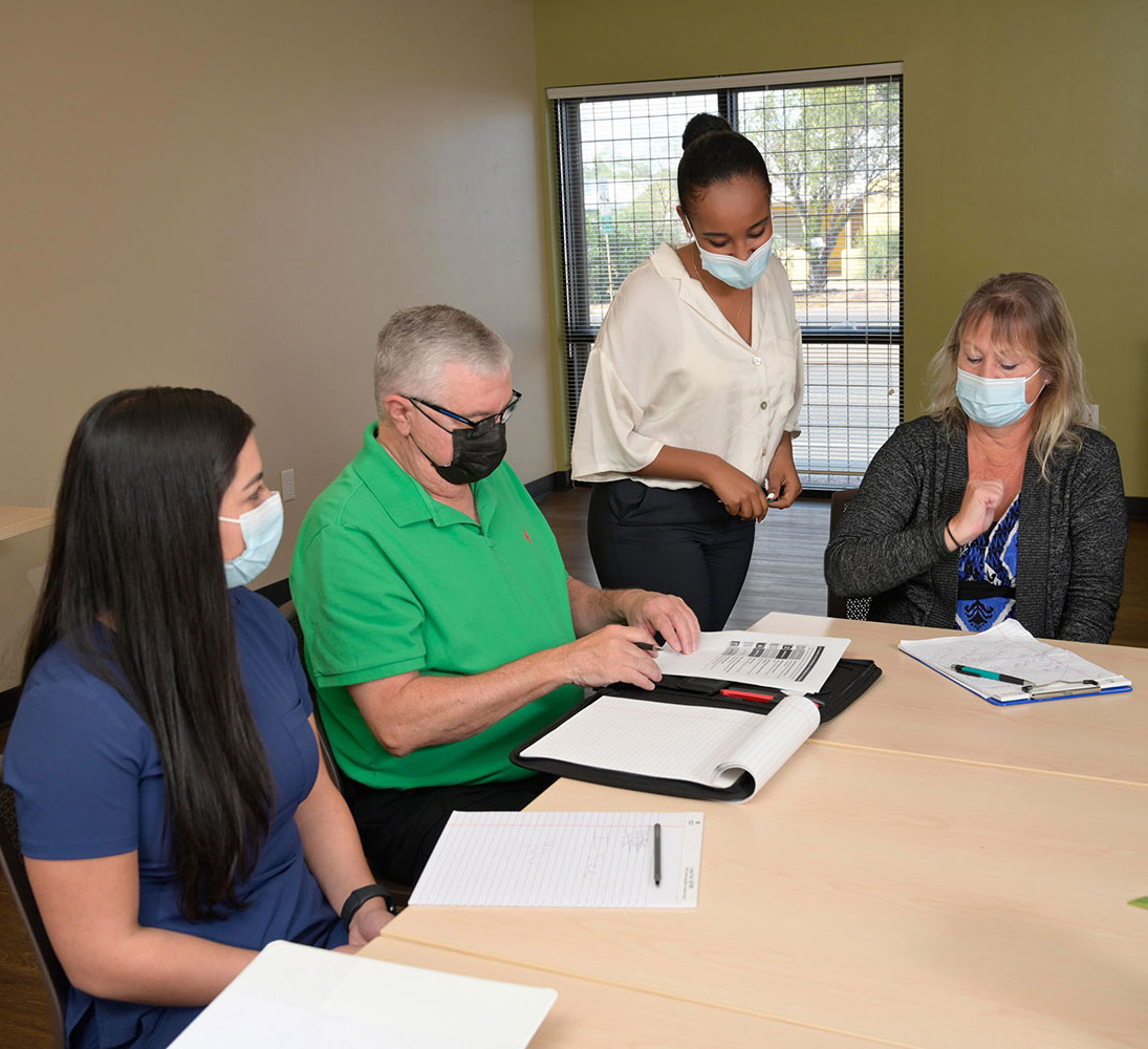 CODAC staff; certified medical assistant, RN, linkage liaison and recovery coach discuss member care.