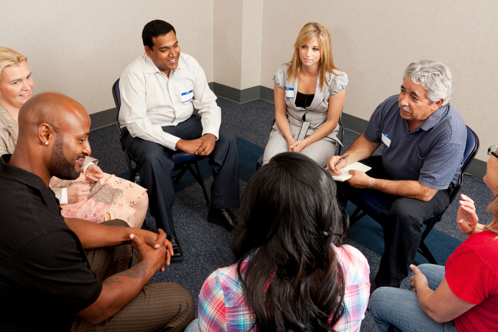 A Group of Participants Sitting on Chairs in a Circle for the CODAC Intensive Outpatient Program.